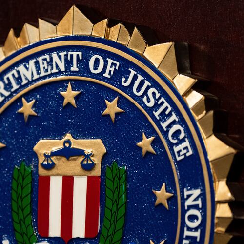 FILE - An FBI seal is displayed on a podium before a news conference at the field office in Portland, Ore., Thursday, Jan. 16, 2025. (AP Photo/Jenny Kane, File)