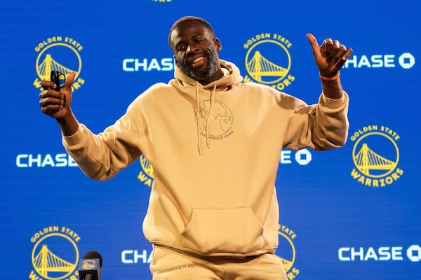 Golden State Warriors forward Draymond Green gestures after speaking during a news conference at the NBA basketball team's facility in San Francisco, Thursday, May 15, 2025. (AP Photo/Jeff Chiu)