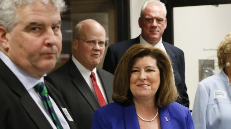 Former Georgia Secretary of State Karen Handel, one of 11 Republicans running in the special election to replace Tom Price in the 6th Congressional District, used her debut ad to target Democrat Jon Ossoff over the work his investigative film company has done for Al-Jazeera, a Qatar-based network that critics describe as a propaganda outlet. BOB ANDRES /BANDRES@AJC.COM