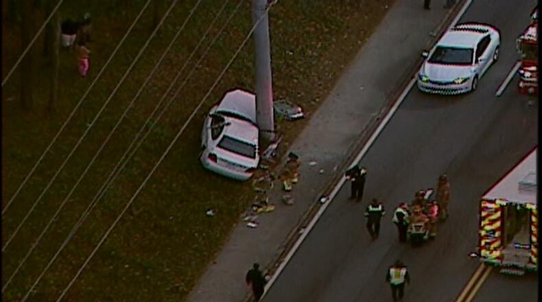 A woman and a fourth-grade boy were hit by a car Thursday morning while waiting for a DeKalb County school bus. (Credit: Channel 2 Action News)