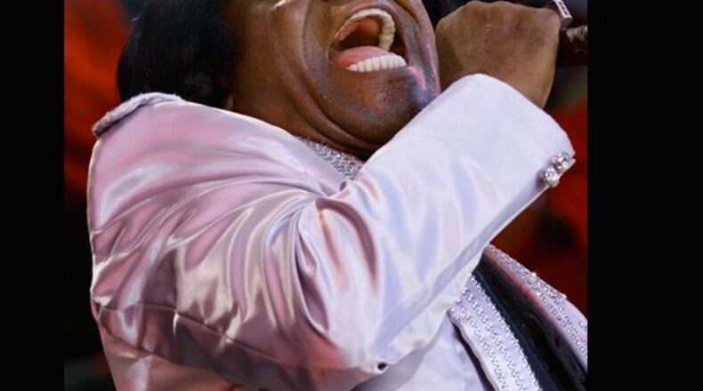 James Brown performs in 2001, at RFK Stadium in Washington. AP Photo/Pablo Martinez Monsivais
