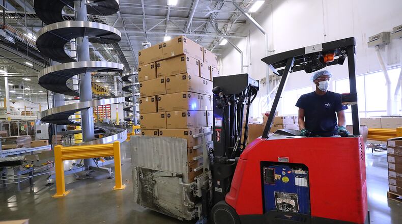 092021 Lithia Springs: A lift operator moves boxes of finished product for shipping from the end of a production line at Medline on Monday, Sept 20, 2021, in Lithia Springs.   “Curtis Compton / Curtis.Compton@ajc.com”