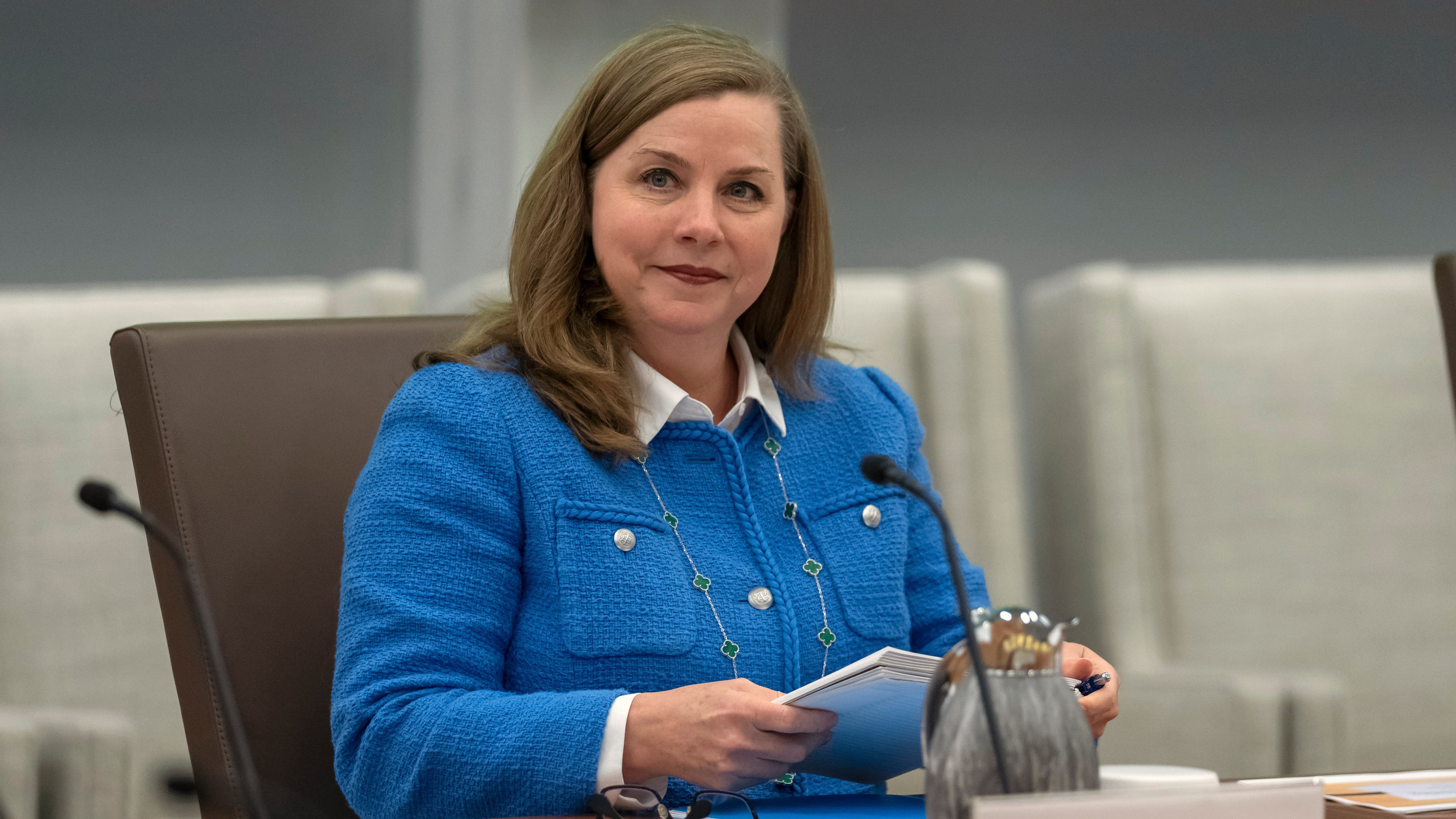 FILE - Michelle Bowman, Vice Chair for Supervision of the Federal Reserve Board of Governors, takes a seat for an open meeting of the Board of Governors at the Federal Reserve, in Washington, June 25, 2025. (AP Photo/Mark Schiefelbein, File)