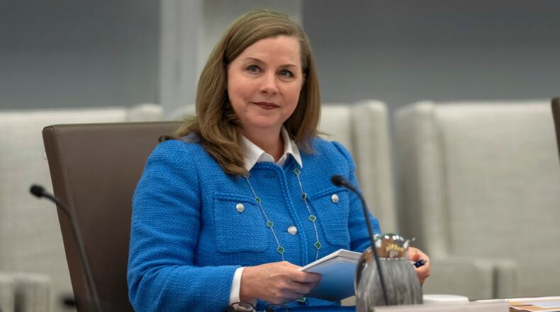 FILE - Michelle Bowman, Vice Chair for Supervision of the Federal Reserve Board of Governors, takes a seat for an open meeting of the Board of Governors at the Federal Reserve, in Washington, June 25, 2025. (AP Photo/Mark Schiefelbein, File)