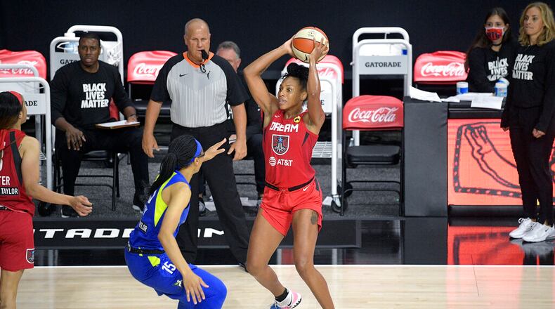 Atlanta Dream guard Betnijah Laney (right). (AP file photo/Phelan M. Ebenhack)