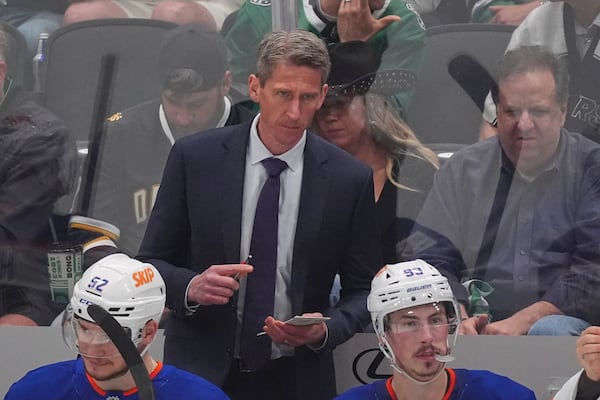 Edmonton Oilers head coach Kris Knoblauch looks on from the bench during the third period in Game 1 of the Western Conference finals in the NHL hockey Stanley Cup playoffs against the Dallas Stars, Wednesday, May 21, 2025, in Dallas. (AP Photo/LM Otero)