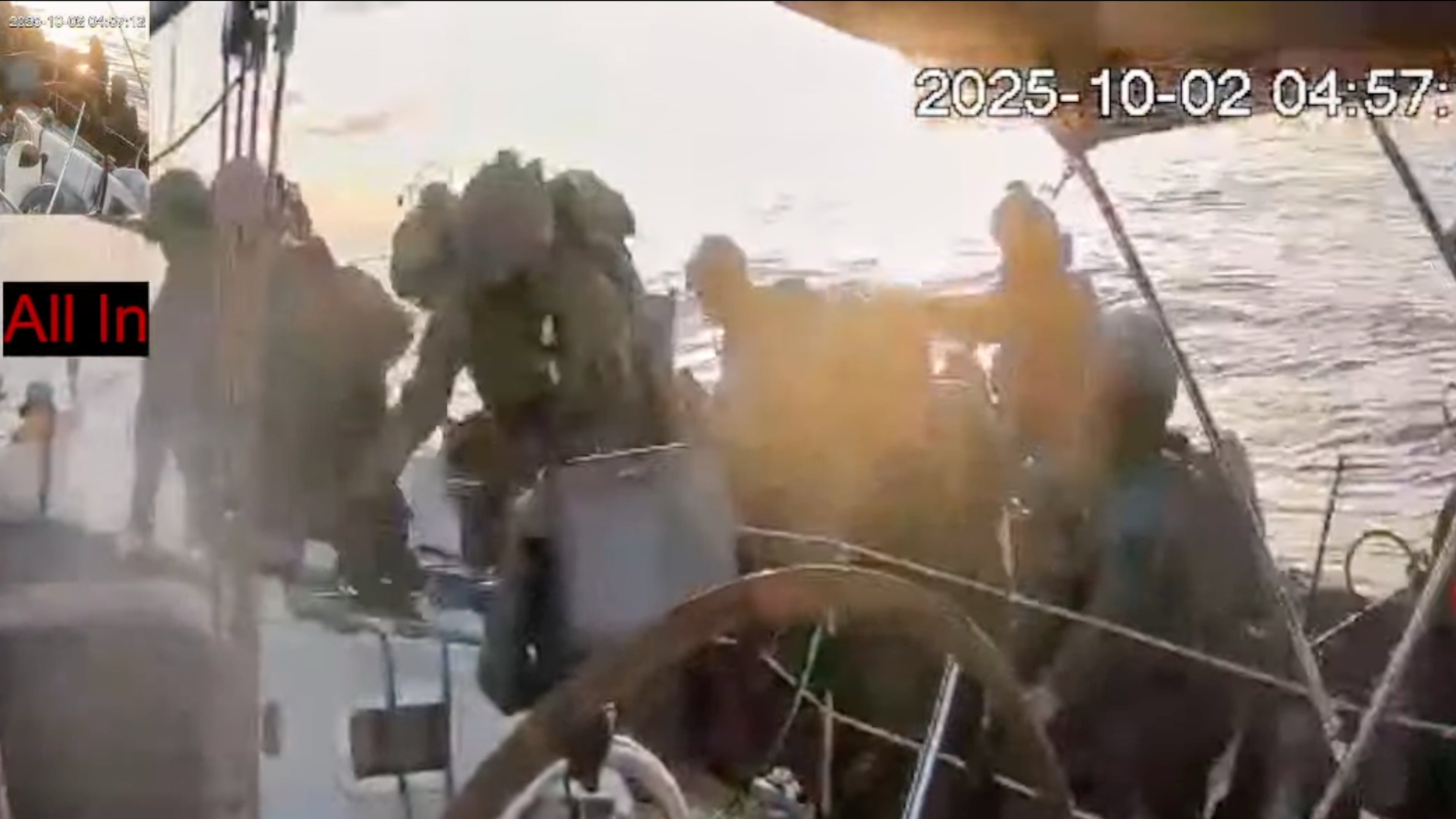 This frame grab from video released by the Global Sumud Flotilla shows Israeli navy soldiers boarding one of the flotilla's vessels as it approached the coast of Gaza early Thursday, Oct. 2, 2025. (Global Sumud Flotilla via AP)