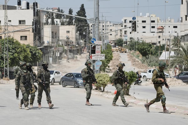 Israeli soldiers are seen during an army operation in Tulkarem, West Bank on Monday, May 26, 2025. (AP Photo/Majdi Mohammed)