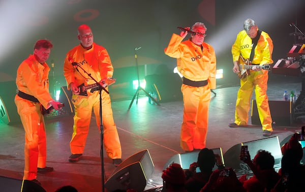Devo (Gerald Casale (from left), Josh Hager, Mark Mothersbaugh and Bob Mothersbaugh) play at 5 p.m. Sunday. (Chris Pizzello/AP file)