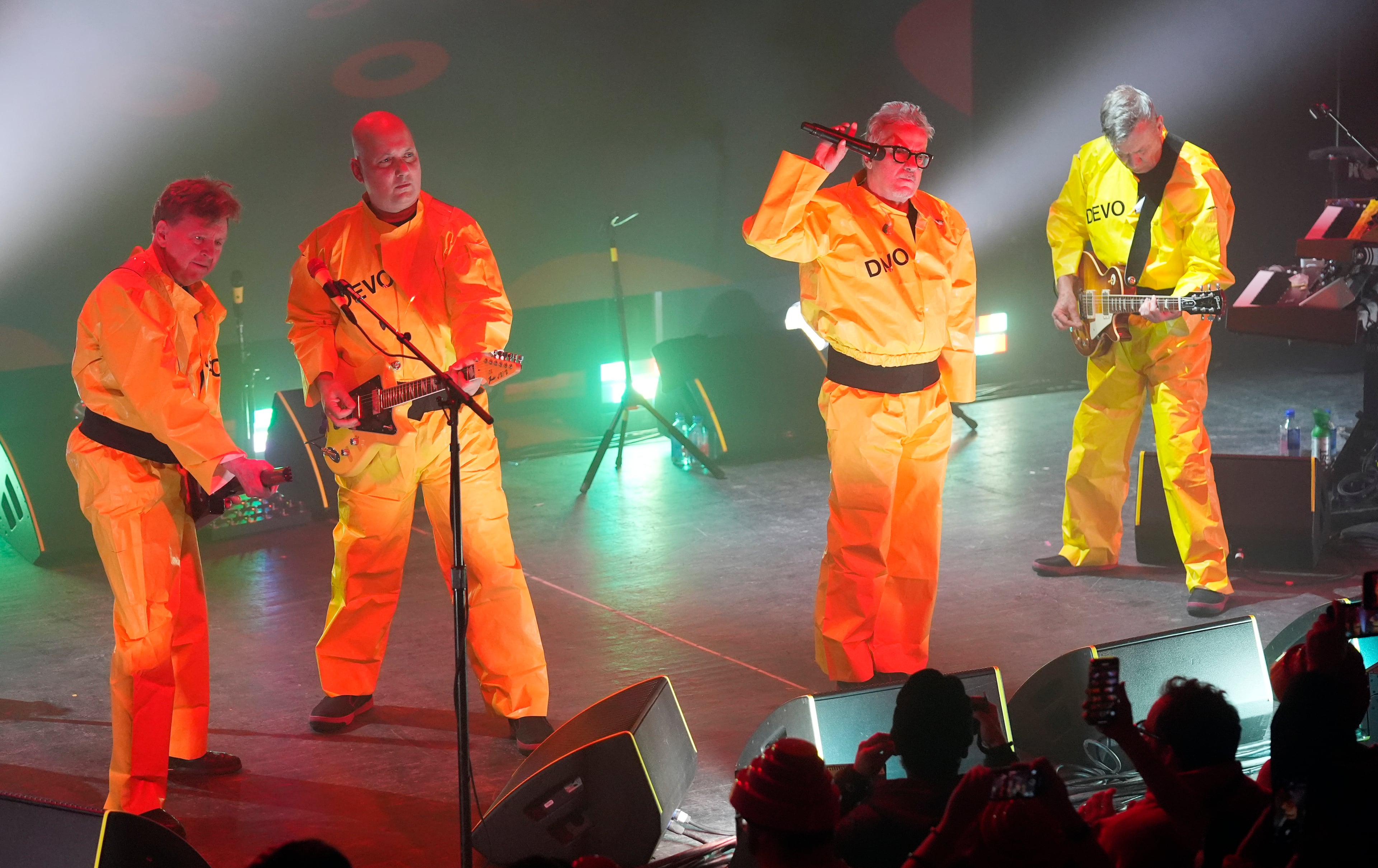 Devo (Gerald Casale (from left), Josh Hager, Mark Mothersbaugh and Bob Mothersbaugh) play at 5 p.m. Sunday. (Chris Pizzello/AP file)