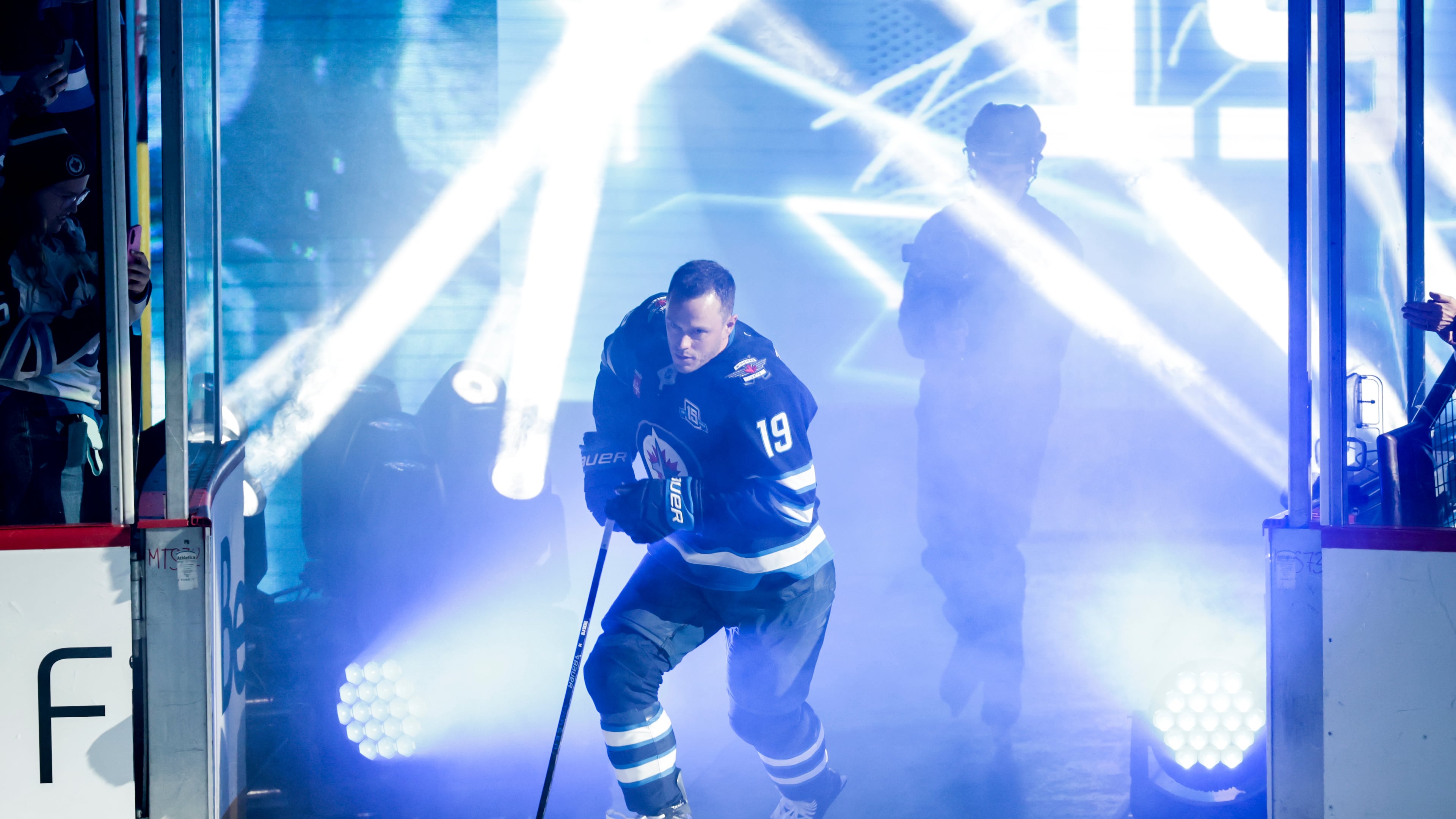 Winnipeg Jets' Jonathan Toews (19) is introduced prior to NHL hockey game action against the Dallas Stars in Winnipeg, Manitoba, Thursday, Oct. 9, 2025. (John Woods/The Canadian Press via AP)