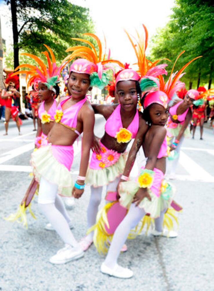 Colorful Caribbean Festival parade dazzles the day