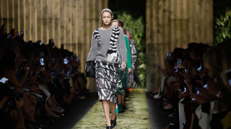 Model Gigi Hadid wears a creation part of the Max Mara women's Spring-Summer 2017 collection, that was presented in Milan, Italy, Thursday, Sept. 22, 2016. (AP Photo/Luca Bruno)