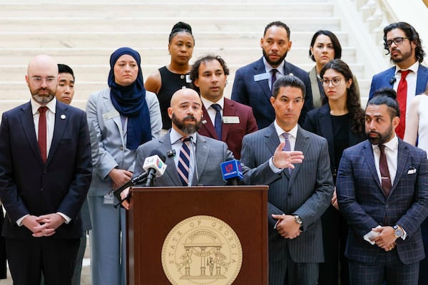 Attorney Giovanni Diaz, representing Spanish-language journalist Mario Guevara speaks at a press conference at the Georgia State Capitol in Atlanta, on Tuesday, July 22, 2025. (Miguel Martinez/Atlanta Journal-Constitution via AP)