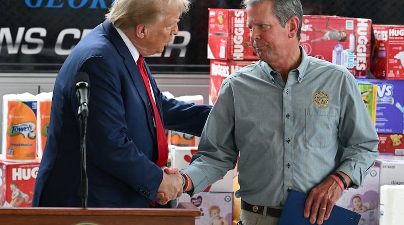 Former President Donald Trump and Gov. Brian Kemp reunited for the first time since the 2020 election to survey damage from Hurricane Helene. (Hyosub Shin/AJC)