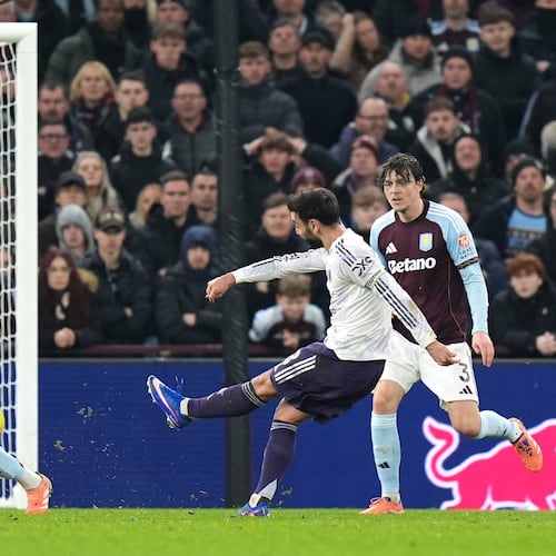 Manchester United's Bruno Fernandes, second right, attempts a shot towards goal during the Premier League soccer match between Aston Villa and Manchester United, in Birmingham, England, Sunday Dec. 21, 2025. (Jacob King/PA via AP)
