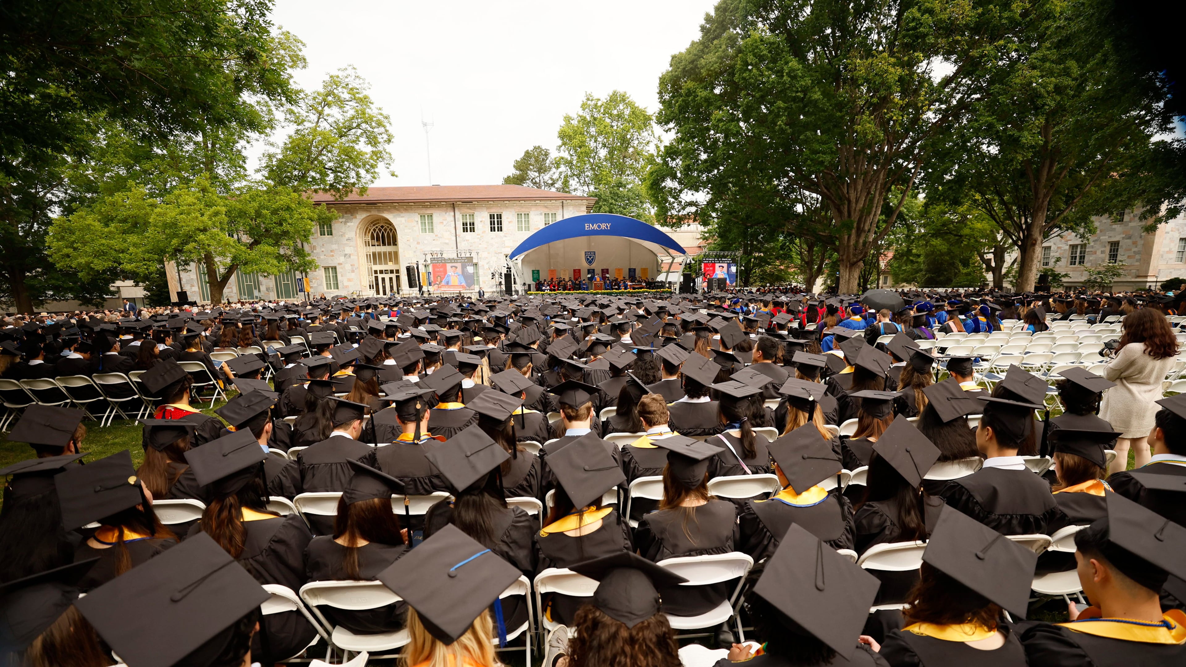 About 4,300 graduating Emory students wait for the commencement ceremony to begin on May 8, 2023. The school is expecting to see a multimillion-dollar increase on its endowment tax liability after recent legislation. (Miguel Martinez/AJC)