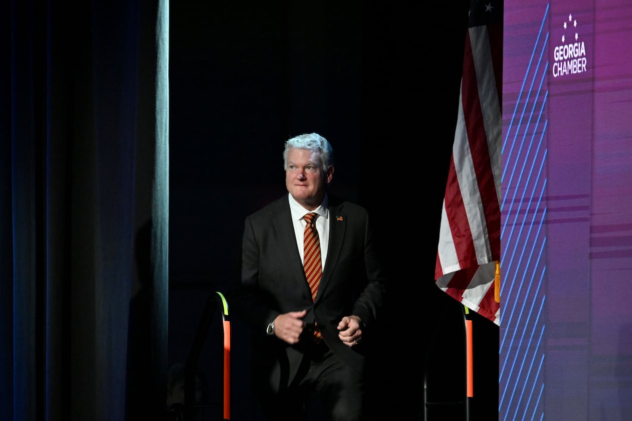 U.S. Rep. Mike Collins takes the stage before delivering a speech during the Georgia Chamber Congressional Luncheon at The Classic Center in Athens on Wednesday, Aug. 5, 2026. (Hyosub Shin/AJC)