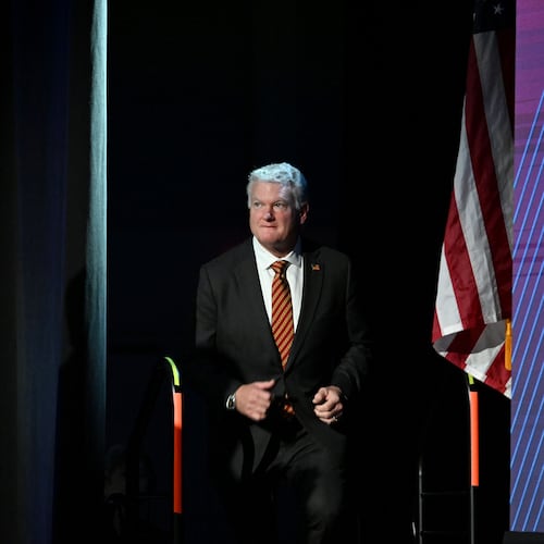 U.S. Rep. Mike Collins takes the stage before delivering a speech during the Georgia Chamber Congressional Luncheon at The Classic Center in Athens on Wednesday, Aug. 5, 2026. (Hyosub Shin/AJC)