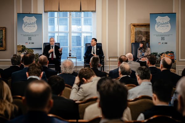 Jim Vena (left), CEO of Union Pacific and Mark R. George, CEO of Norfolk Southern, speak during a joint presentation at Railway Age’s Next Generation Freight Rail conference at the Union League Club of Chicago on March 10, 2026. It was their first time together on a public stage. (Jamie Kelter Davis for the AJC)