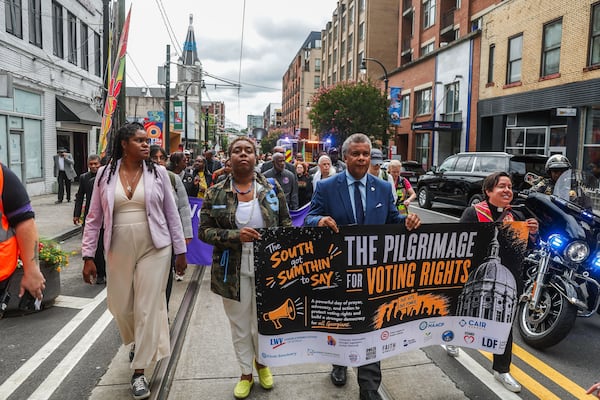 Protesters march to the Georgia Capitol on Wednesday, June 17, 2026. (Abbey Cutrer/AJC)