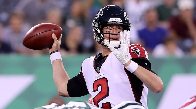 EAST RUTHERFORD, NJ - AUGUST 10: Matt Ryan #2 of the Atlanta Falcons passes under pressure from Jordan Jenkins #48 of the New York Jets during a preseason game at MetLife Stadium on August 10, 2018 in East Rutherford, New Jersey. (Photo by Elsa/Getty Images)