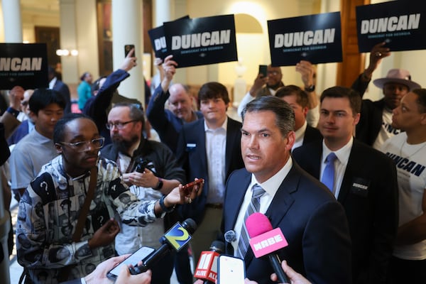 Democratic candidate Geoff Duncan addresses reporters Friday after filing paperwork to run for governor. (Arvin Temkar/AJC)