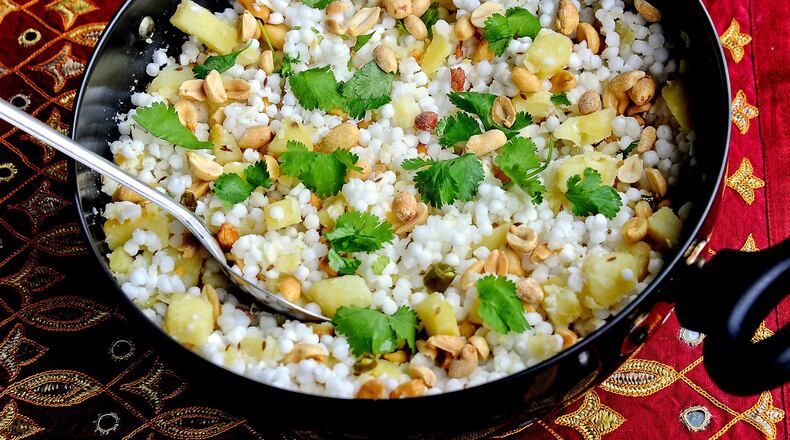 Sabudana khichdi is made with tapioca pearls, cubed potatoes, peanuts, green chilies and lime juice, garnished with cilantro. (Lake Fong/Pittsburgh Post-Gazette/TNS)