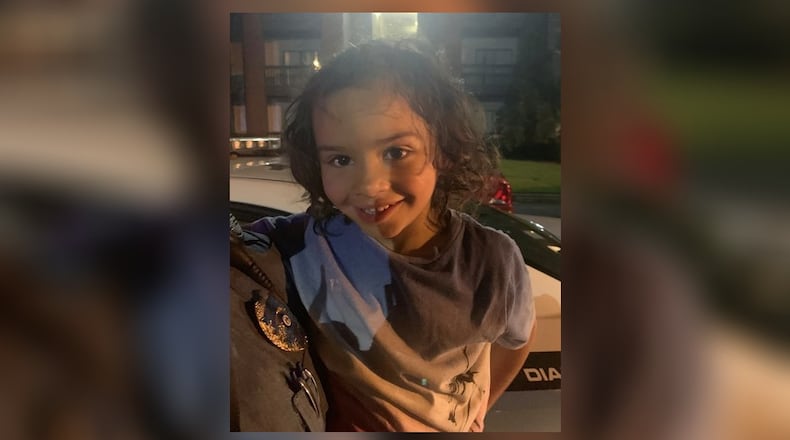 Police were trying to find this girl's parents after she was found wandering naked by herself Tuesday.