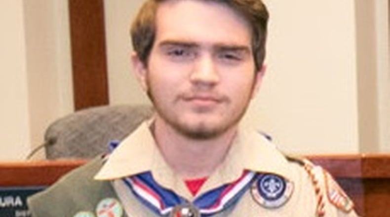 The Forsyth County Board of Commissioners presented a resolution commending Reagan Davis for attaining the rank of Eagle Scout. For his Eagle Scout project, Davis created the design for a wooden information kiosk at Mars Hill Cemetery. Davis also led other scouts and adults in the building of the kiosk. Davis is a junior at South Forsyth High School and member of Troop 39 of the Boy Scouts of America.