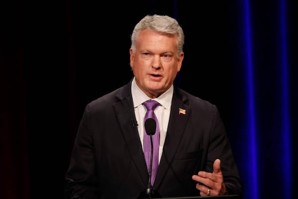 U.S. Rep. Mike Collins, R-Jackson, speaks at the Atlanta Press Club Loudermilk-Young primary election debate for the U.S. Senate at Georgia Public Broadcasting on Sunday. (Miguel Martinez/AJC)