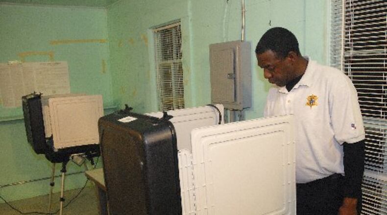 Willie Anderson votes at the Hoggards Mill Precinct in Baker County on Nov. 4.