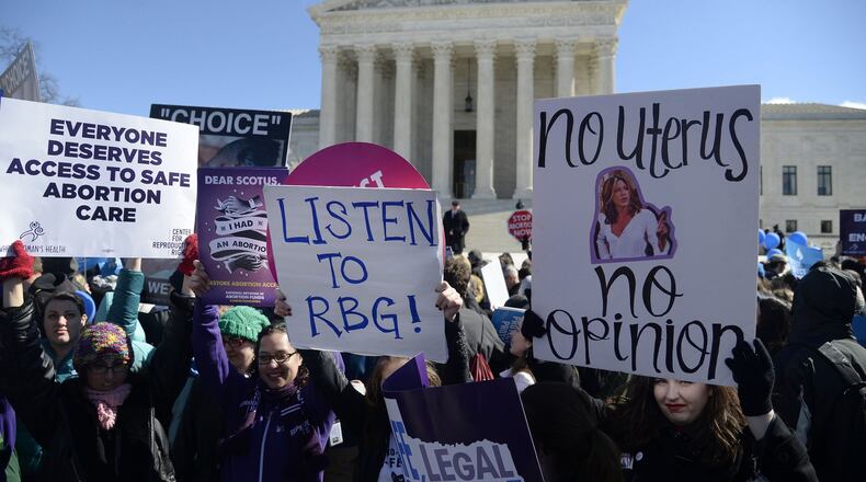 Supporters of legal access to abortion, as well as anti-abortion activists, rally outside the Supreme Court on March 2, 2016, in Washington, D.C. (Olivier Douliery/Abaca Press/TNS)