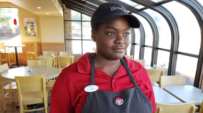 Skiteafa Allen, who works at a Wendy’s restaurant in Suwanee, is among a growing number of Georgia employees who rely on early access to a portion of their wages, rather than waiting for traditional paydays a week or two out. MATT KEMPNER / AJC