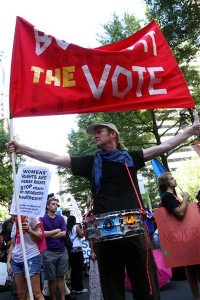 Signs seen for and against DNC in Charlotte