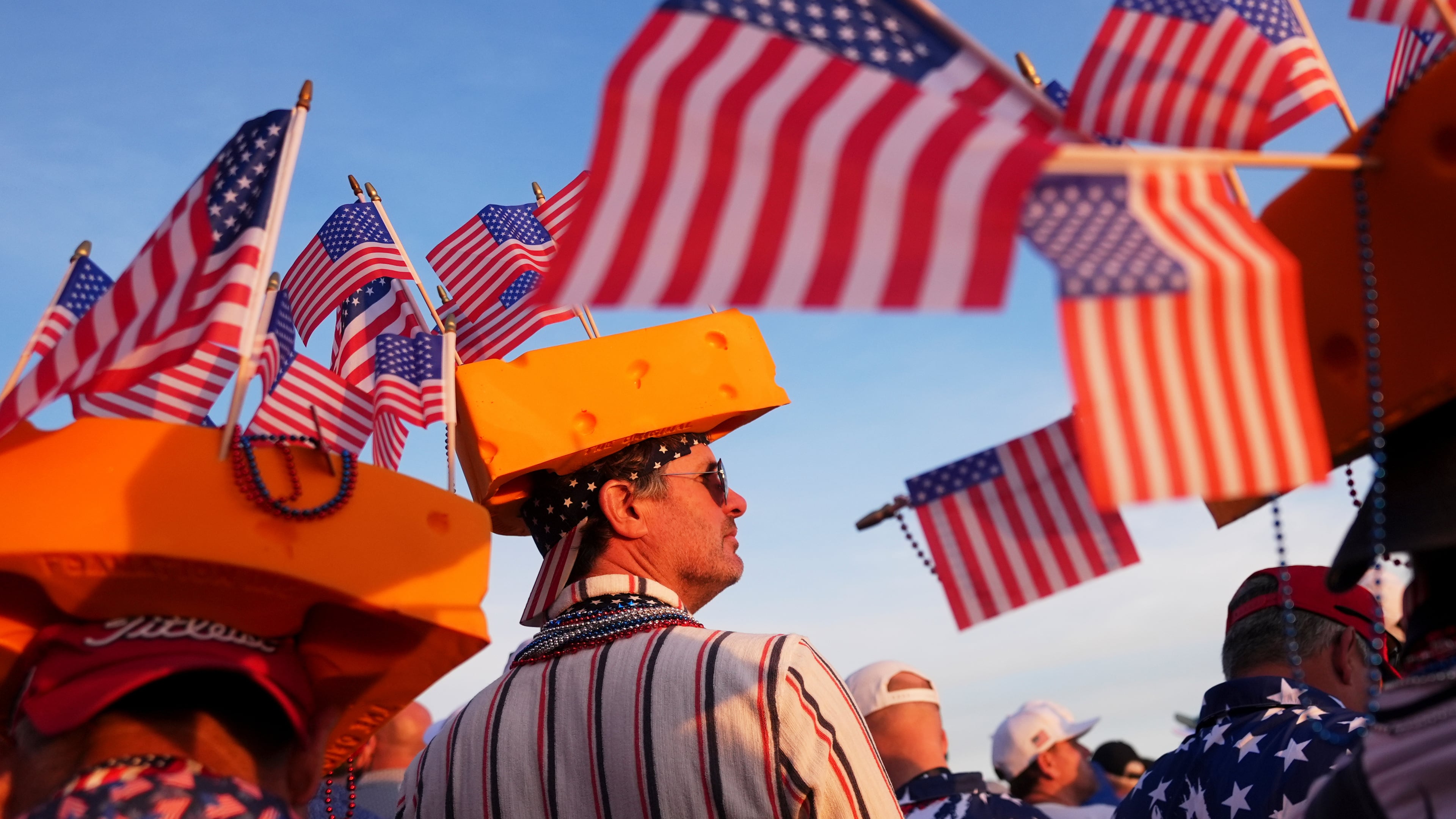 Fans watch on the first hole at Bethpage Black golf course during the Ryder Cup golf tournament, Saturday, Sept. 27, 2025, in Farmingdale, N.Y. (AP Photo/Lindsey Wasson)