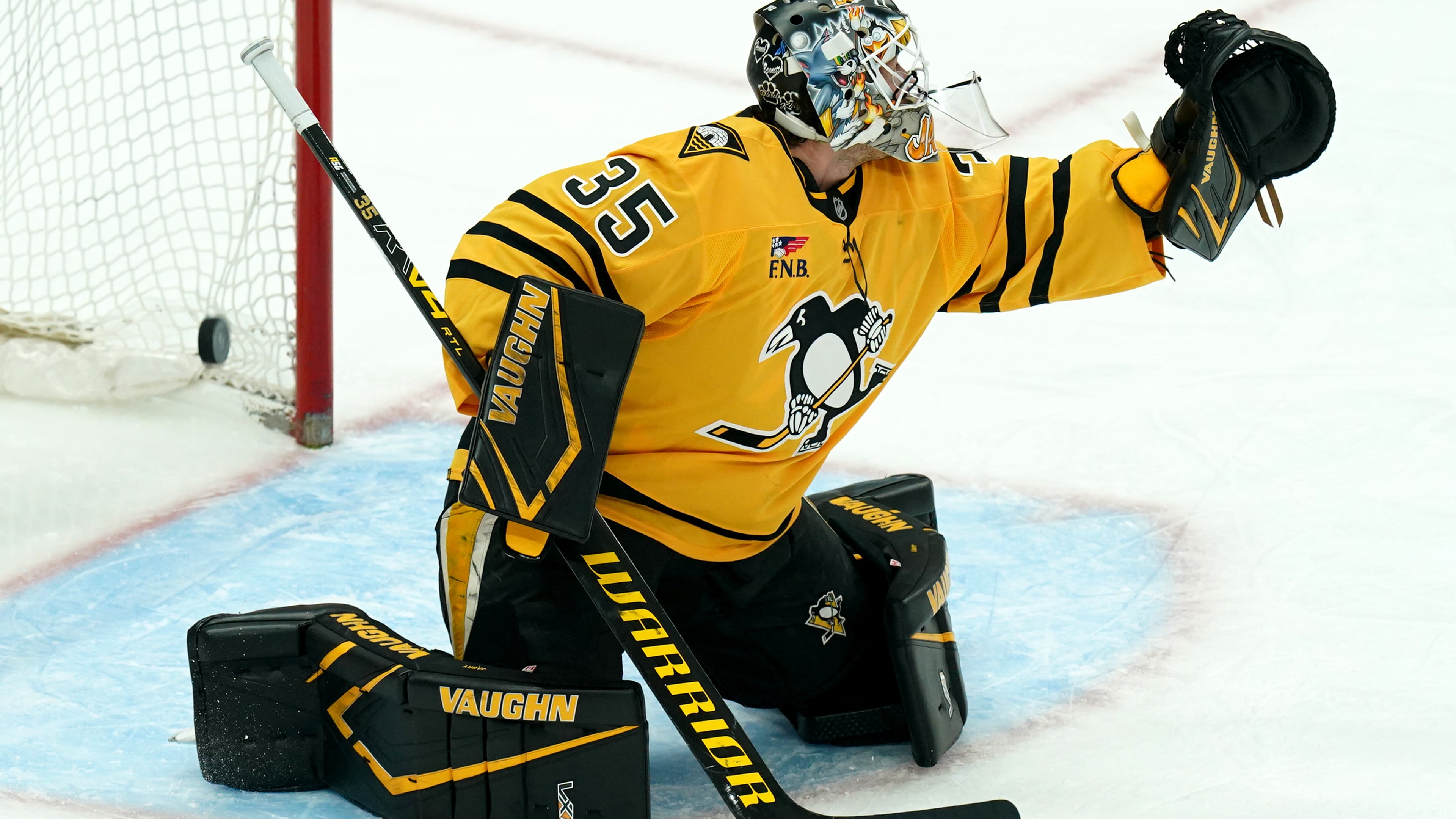 A shot by Montréal Canadiens' Alexandre Texier gets by Pittsburgh Penguins goaltender Tristan Jarry (35) for a goal during the first period of an NHL hockey game, Thursday, Dec. 11, 2025, in Pittsburgh. (Matt Freed/Pittsburgh Post-Gazette via AP)