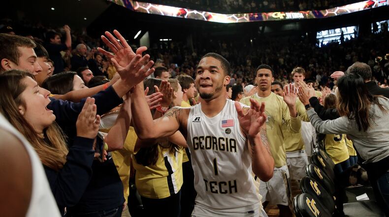 Georgia Tech guard Tadric Jackson (1) celebrates with fans after defeating Notre Dame 62-60 in an NCAA college basketball game Saturday, Jan. 28, 2017, in Atlanta. (AP Photo/John Bazemore)
