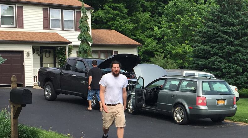 Michael Rotondo, 30, prepares to leave his parents’ house in Camillus, N.Y., on June 1, 2018. Rotondo, whose eviction from his parents’ home drew national attention, finally left that day, hours before a court-ordered deadline. DOUGLASS DOWTY / THE POST-STANDARD VIA AP