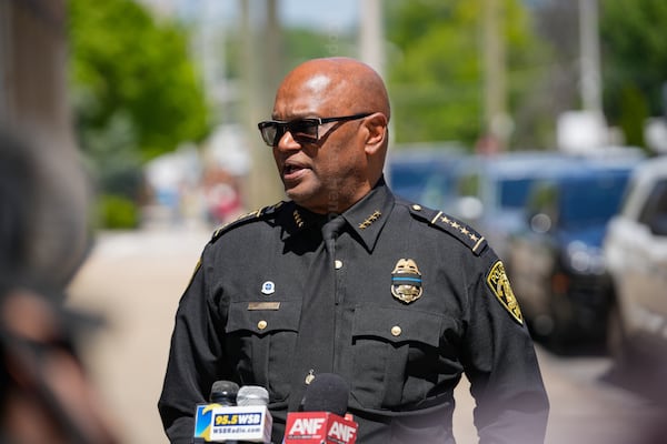 South Fulton Police Chief Keith Meadows gives an update on his officer's condition outside Grady Hospital on April 18. Two officers were injured in a shootout that killed the suspected gunman, according to South Fulton police. (Ben Hendren for the Atlanta Journal-Constitution)