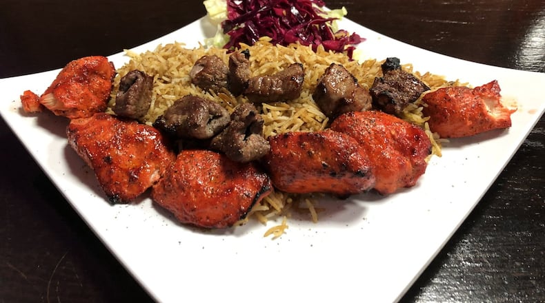 The tandoori chicken and tikka lamb kebabs at Ariana Kabob House in Duluth. CONTRIBUTED BY WENDELL BROCK