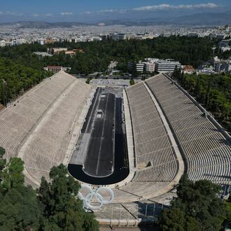 An aerial view of the Panathenaic Stadium, also known as "Kallimarmaro, or beautiful marble," which hosted the first modern Olympic Games in 1896, is seen during renovation work in Athens, Greece, Thursday, Aug. 13, 2026. (AP Photo/Thanassis Stavrakis)