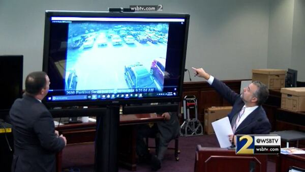 Maddox Kilgore, right, asks Cobb County lead detective Phil Stoddard questions about where Justin Ross Harris parked at the Home Depot Treehouse, during Harris' murder trial at the Glynn County Courthouse in Brunswick, Ga., on Tuesday, Oct. 25, 2016. Kilgore implied that Harris did not park his car in a place where it would not be seen by passers-by. (screen capture via WSB-TV)