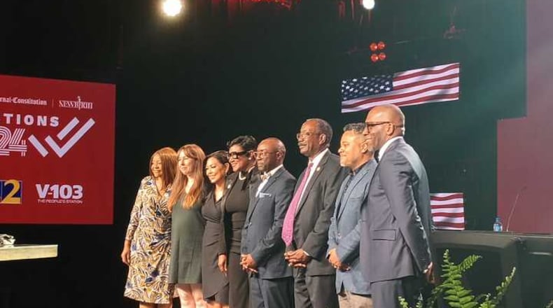 Candidates and panelists on stage after the DeKalb County CEO forum
