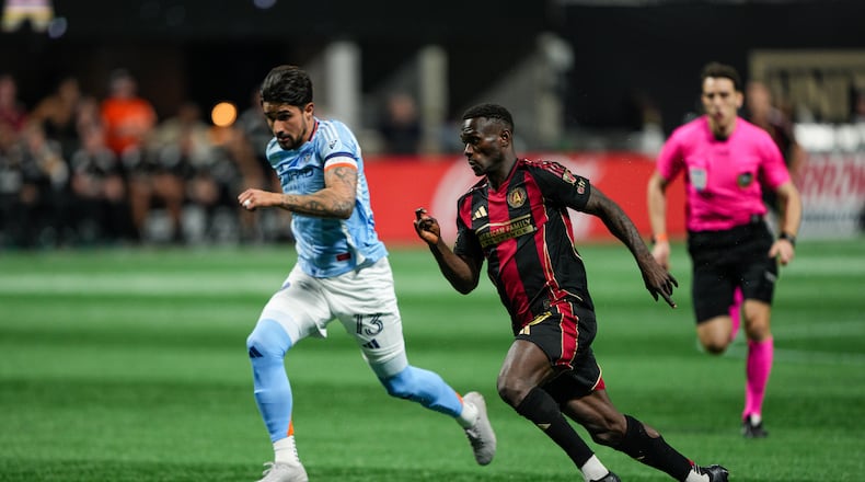 Atlanta United forward Emmanuel Latte Lath #19 dirbbles during the match against the New York City FC at Mercedes-Benz Stadium in Atlanta, GA on Saturday March 29, 2025. (Photo by Matthew Grimes/Atlanta United)