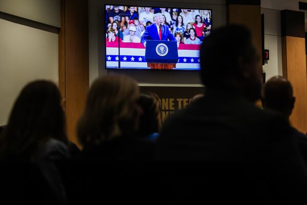 A video from President Trump’s visit is played during a Cobb County school board meeting in Marietta on Thursday, July 23, 2026. (Abbey Cutrer/AJC)