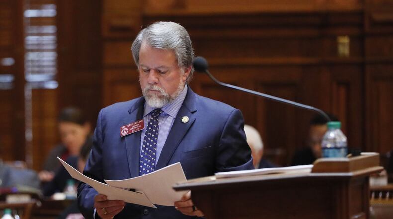 House Appropriations Chairman Terry England, R - Auburn, prepares to present the mid-year budget. BOB ANDRES /BANDRES@AJC.COM