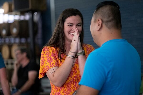 Frances Bullard, a regular at Wilder Smith’s weekly dance class at Wild Heaven, reacts after nailing a dance move with a partner. Ben Gray/ben@bengray.com