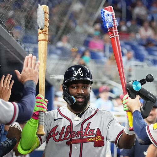 The Braves' Michael Harris II is congratulated after hitting a solo home run during the ninth inning against the Marlins on Thursday, May 21, 2026, in Miami. (Lynne Sladky/AP)