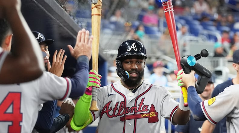 The Braves' Michael Harris II is congratulated after hitting a solo home run during the ninth inning against the Marlins on Thursday, May 21, 2026, in Miami. (Lynne Sladky/AP)